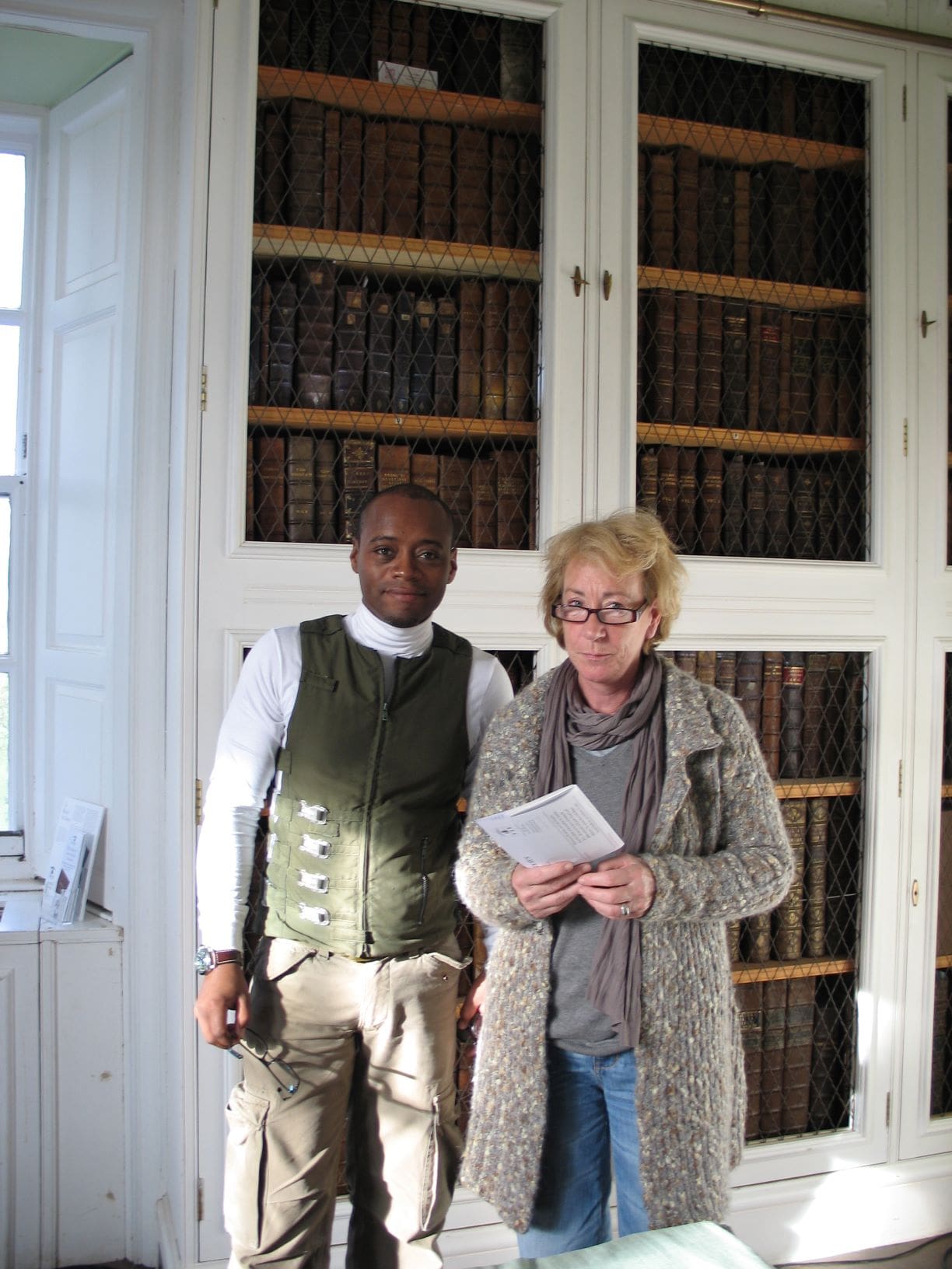 Actors Fraser James and Ellie Haddington on location at Innerpeffray Library.